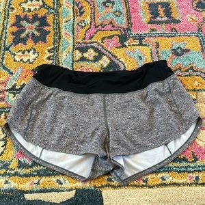 Black, gray, and white Lululemon shorts.